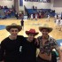 Seniors Erik Johnson, Justin Spivack and Chris Hallock all support the boys basketball team on Dec. 23.