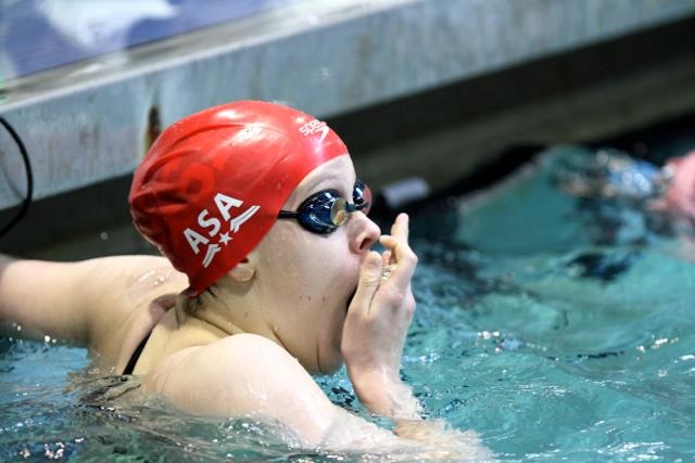 Junior Hannah Lindsey reacts to qualifying for the 2016 Olympic Trials in the 200 meter backstroke at the NCSA Junior Nationals in Orlando