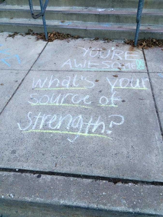 SOS peer leaders, led by social studies teacher Jamie Frank, wrote positive messages outside the school to inspire students. The eight sources of strength refer to family support, generosity, healthy activities, medical access, mental health, mentors, positive friends and spirituality. 