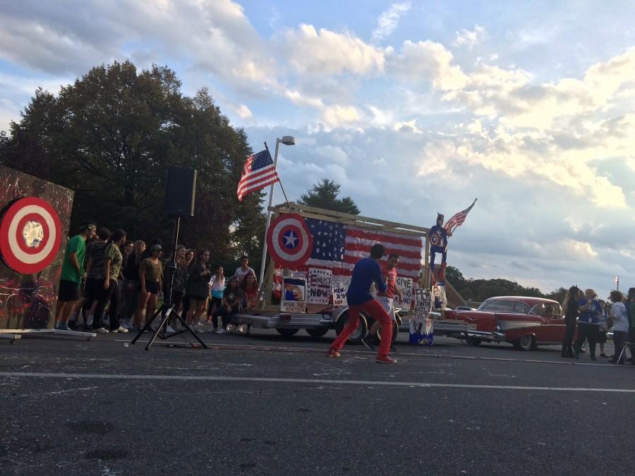 Juniors show off their Captain America float before the football game