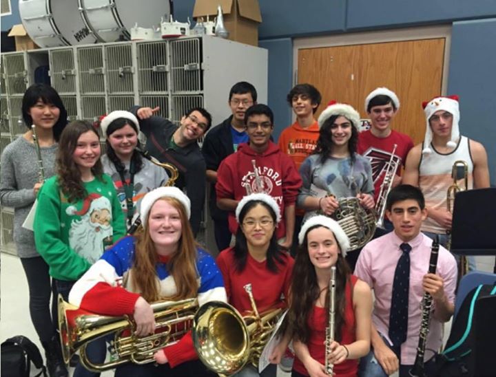 Band members participate in the yearly winter tradition of caroling around school during the last day before winter break.