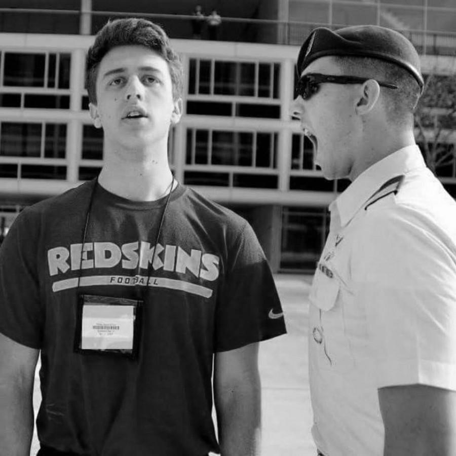 CHS ‘12 alumnus and senior Air Force Academy Cadet Colin Asbury loudly welcomes a new cadet to basic training this past summer.