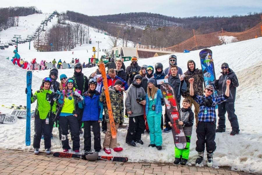 The Bryce ski team poses as a group at the top of the slopes at the Whitetail resort.  School ski clubs would have similar experiences traveling to ski resorts and skiing as a group. 