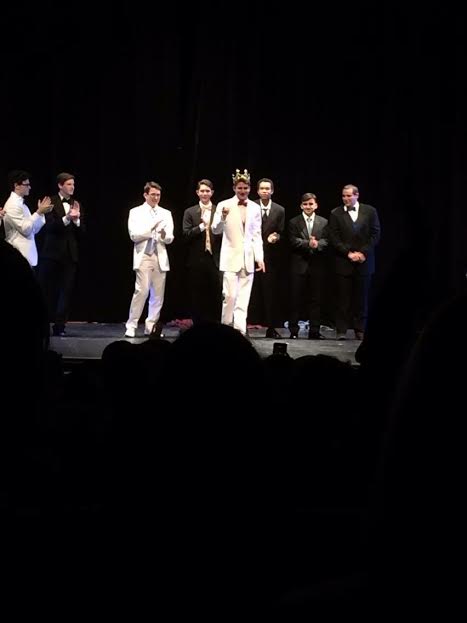 Senior Jake Certner accepts his crown after emerging victorious from the annual Mr. Churchill competition. 