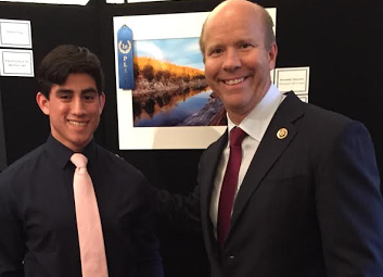Alex Zarynow poses with Congressman John Delaney at the Congressional Art Competition. Zarynow has achieved much success through his photography.
