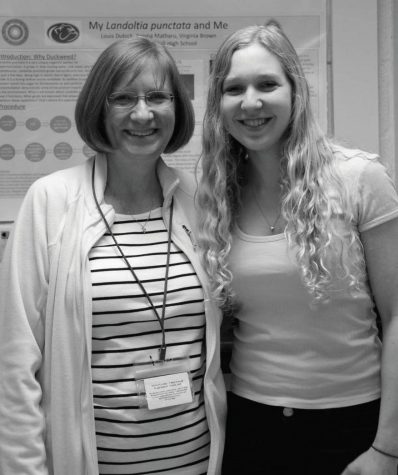 Junior Sarah Sachar with Molecular Genetics teacher Virginia Brown. Sachar recieved an honorable mention and $100 for her essay.
