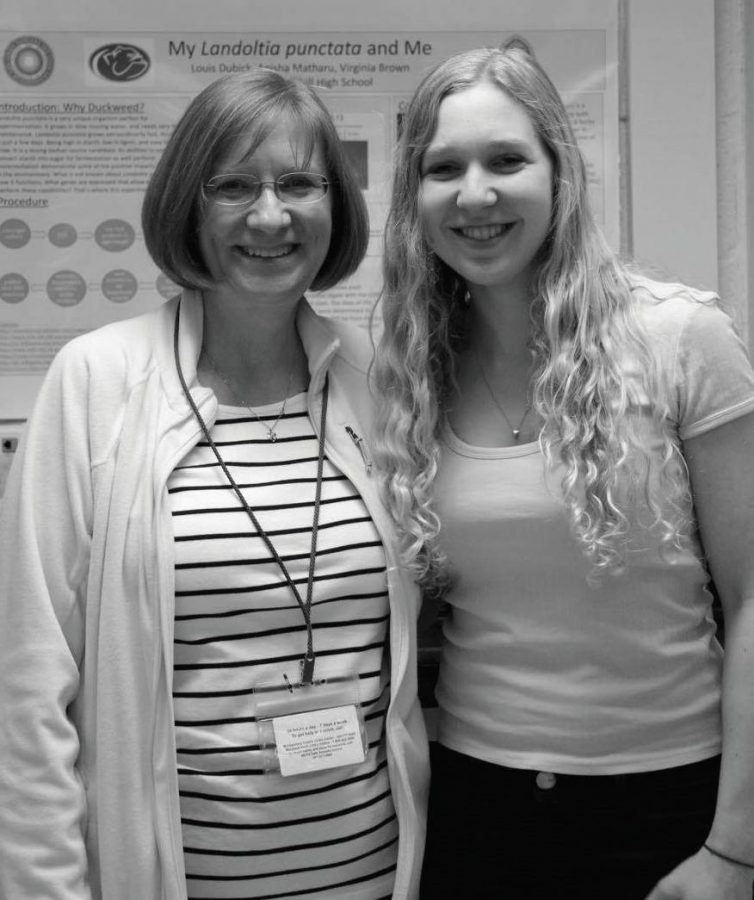 Junior Sarah Sachar with Molecular Genetics teacher Virginia Brown.  Sachar recieved an honorable mention and $100 for her essay.
