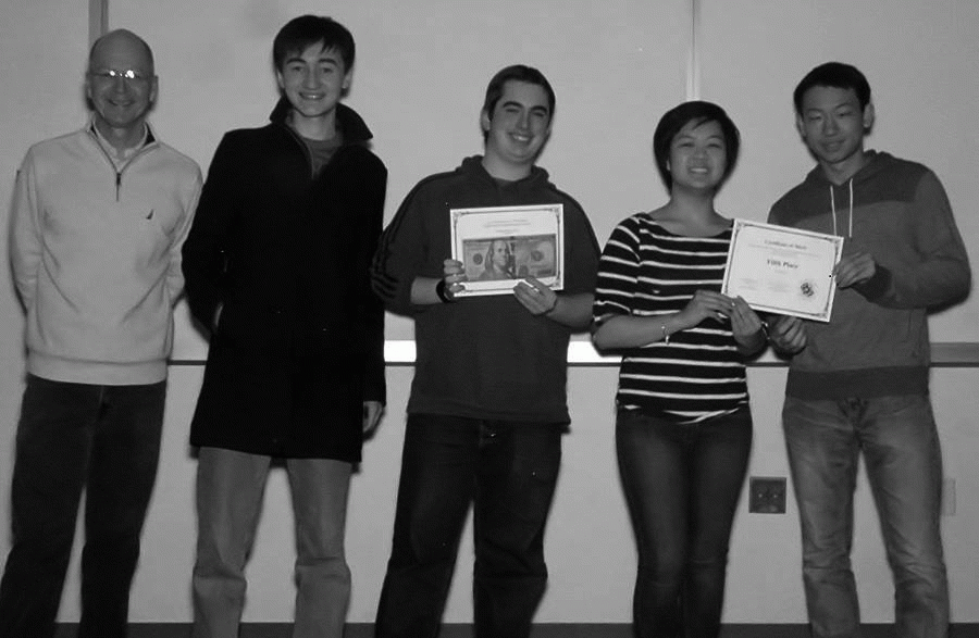 Junior Joseph Primmer and seniors Ben Eisner, Dorothy Hu and Brandon Lieuw pose their certificate and cash prize