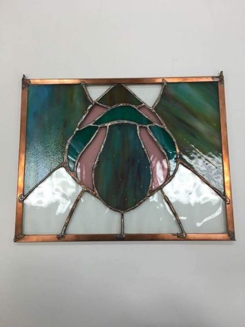 Joelle Goldberg created a stained glass piece for last year’s Consensus chain. The theme was the Montgomery County Agricultural Fair.