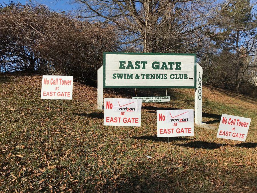 Signs have been put up at the East Gate Swim and Tennis Club in protest of the proposed Verizon Wireless cell phone tower.