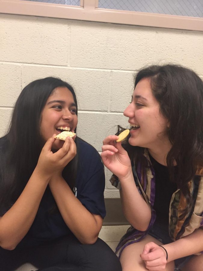 Two CHS students participate in Mukbanging, a common form of ASMR, in which people eat and record the sounds of chewing food. ASMR has become popular among teenagers on social media.