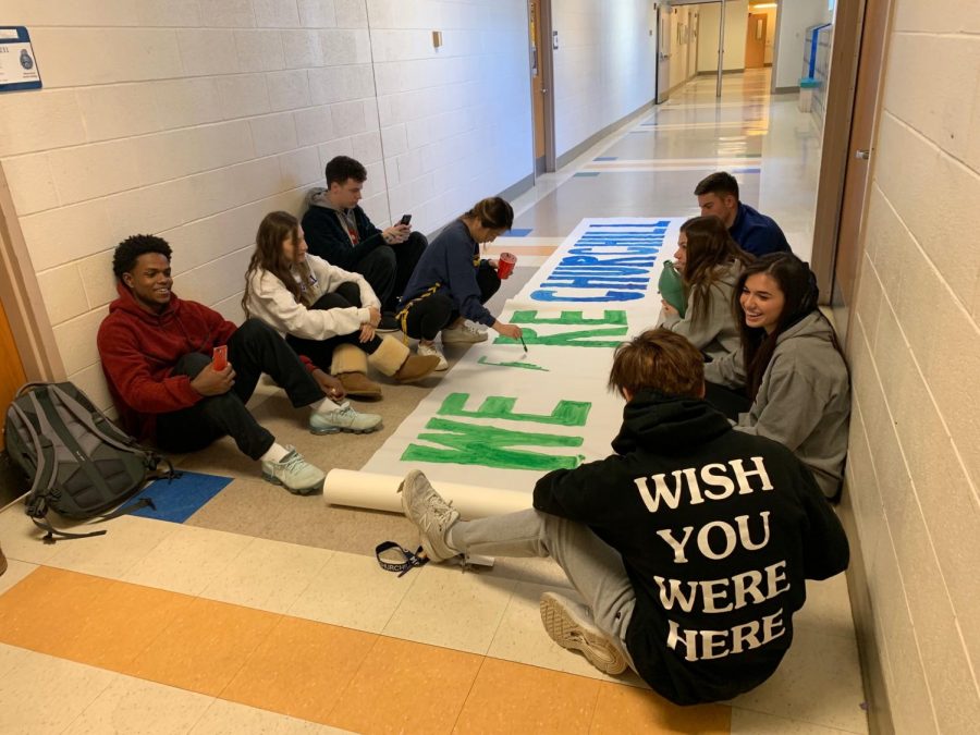 Students in leadership class work to promote a united WCHS community through artistic pieces such as banners. Also, a new advisory period will take place once a month for students and staff to discuss grade level and community-wide issues.