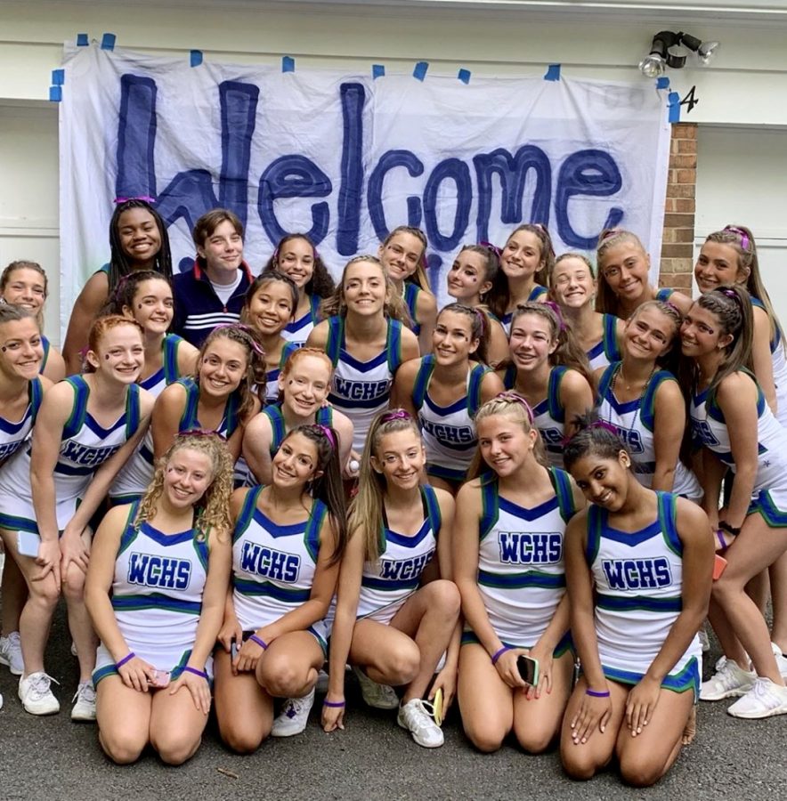 WCHS Varsity Cheer welcomes the newest additions to the team before the season opener football game.