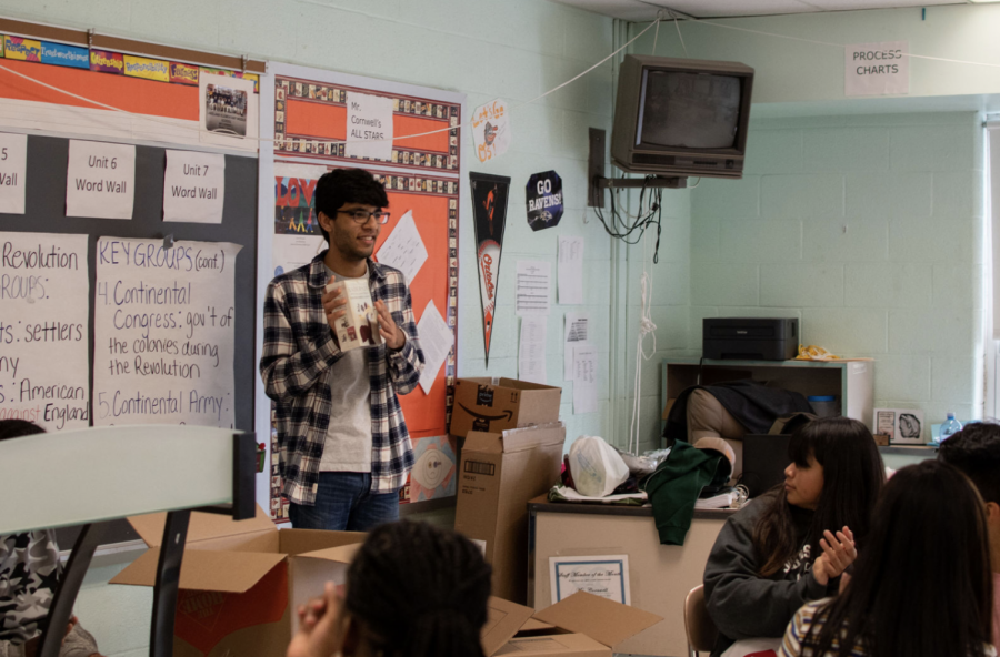 WCHS senior Robin Bali travels to Lakeland Elementary School Middle School in Baltimore, Md. to deliver books and other supplies. In the photo, Bali is giving a presentation to students that attend this school and is extremely grateful for their reactions.