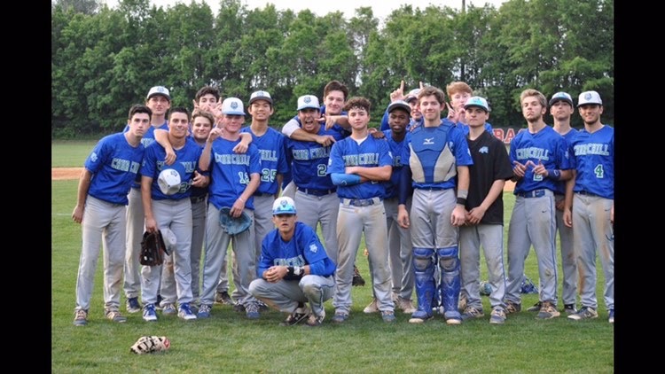 2019+WCHS+baseball+team+posing+for+a+squad+pic+after+big+win.