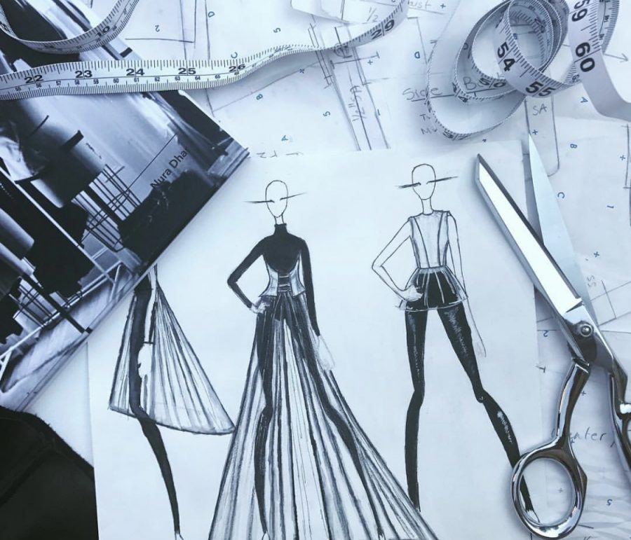 One part of Nura Dhars fashion design process is sketching out possible designs for collections.