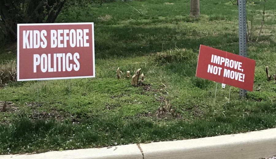 One school board member now has signs on her lawn opposing redistricting. Lets improve Churchill before anyone talks about moving there, she said. 