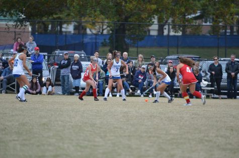Katherine Yi and her varsity field hockey teammates play against the Wootton team during the 2019 fall season. Unlike previous years, the virtual fall season in MCPS does not allow for in person practices and games. 