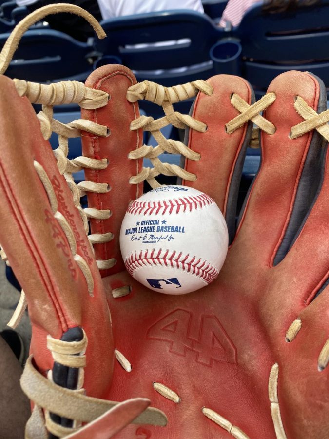 Although many staple ballpark traditions arent taking place anymore due to COVID, fans can still get game balls from players. Here, Max Brodsky shows off one he recieved from the Nationals game on May 22nd. 