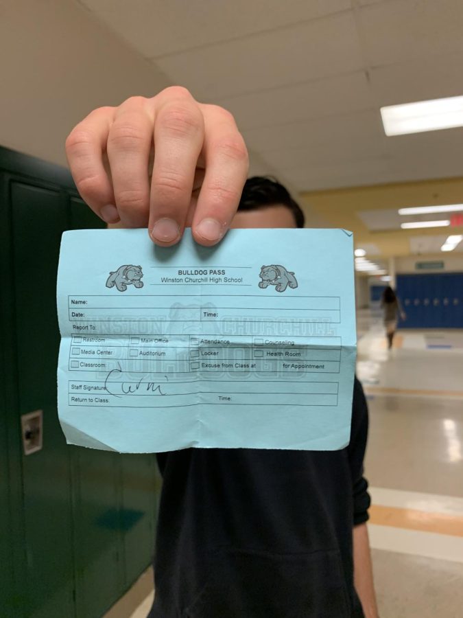 All students must carry blue passes in the halls as a requirement of the new hall pass system under 2021 administration. 