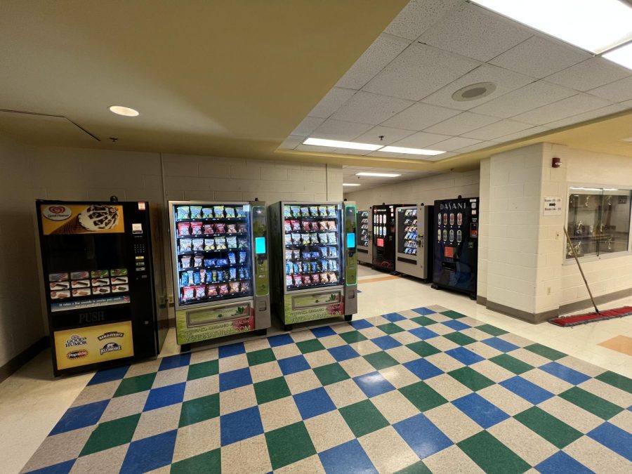 While it may look empty during classtime, the group of vending machines near the cafeteria are surrounded with students during lunch and after school, making it one of the most popular places students go to.