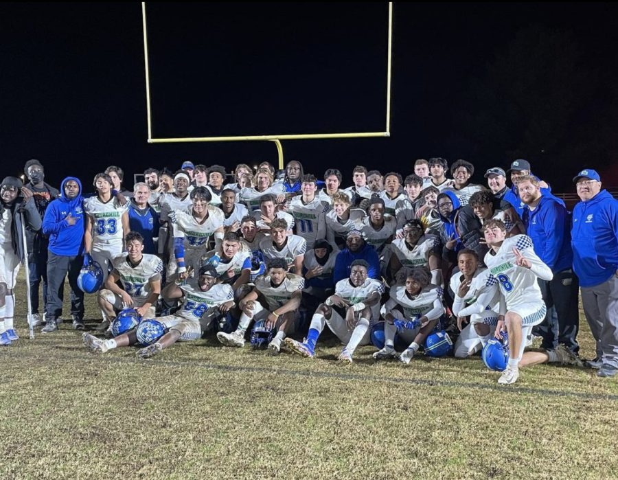 The+Varsity+Football+Squad+posing+for+their+final+group+photo+after+having+an+outstanding+season.+The+team+went+8-3+and+won+their+first+playoff+game+in+ten+year.+It+was+a+great+follow+up+to+a+down+2019+season+and+an+okay+2020+season.+This+year+really+showed+improvements+on+all+levels.