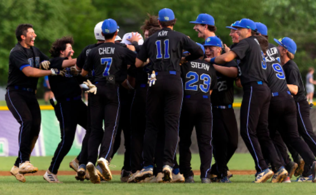 Members of the Bulldogs jump in celebration after a well-earned 4-3 win over Urbana on May 4. This victory showed the Bulldogs can compete with formidable teams in Maryland and pushed them to 14-0