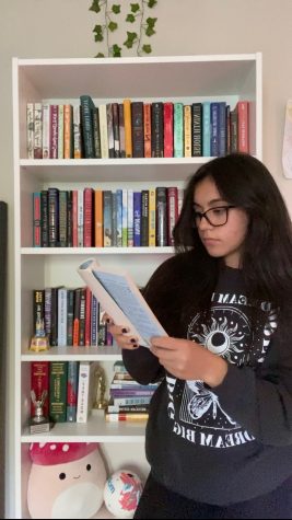On December 1, 2022 Isabella Phelps reads The Queens Gambit from her bookshelf, which is on her list of books to read during break. 