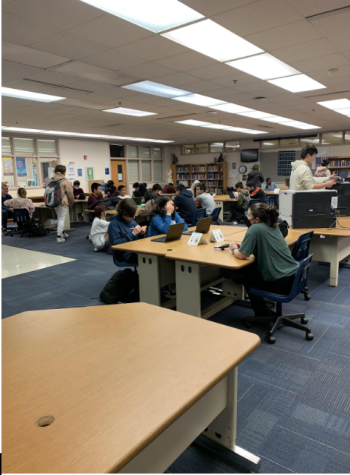 Students at the WCHS library study and get work done before school starts, in groups or by themselves. 
