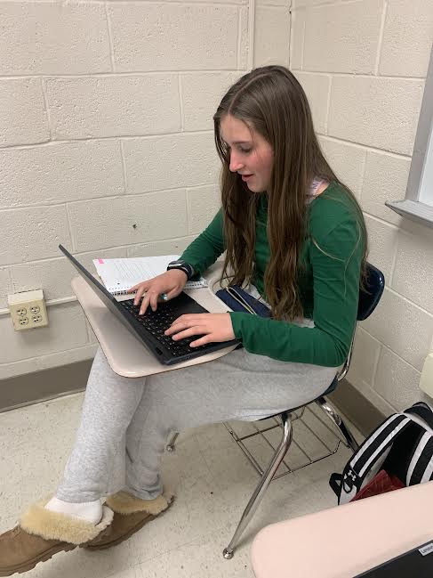 Freshman Cailey Harrington works on an assignment for her English class to make sure she gets it in before the next deadline.