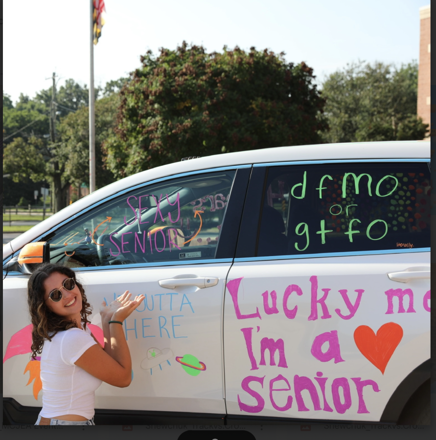 A+tradition+for+many+rising+seniors+is+decorating+cars+before+the+start+of+senior+year.+Jordan+Lapidus%2C+a+member+of+the+class+of+2023%2C+poses+with+the+car+her+friends+decorated.+Making+formative+memories+like+this+are+a+fun+way+to+commemorate+the+last+year+of+high+school.++