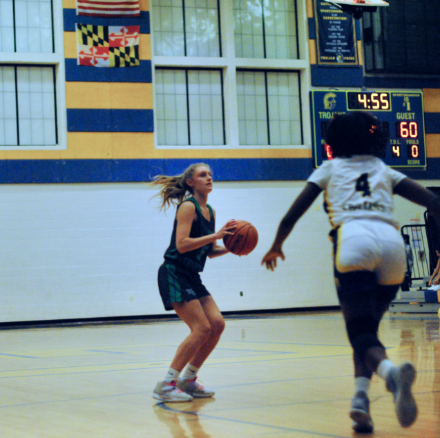 To start the second half, senior captain Chelsea Calkins pulls up for a jumper against Gaithersburg High School. This was her first game of the season and they had a large lead in the first half.