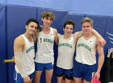A relay squad comprised of Nathan Encinas, Bradan Welby Stepan Volkov and Griffin White (left to right) takes home a regional win after another dominant performance. 