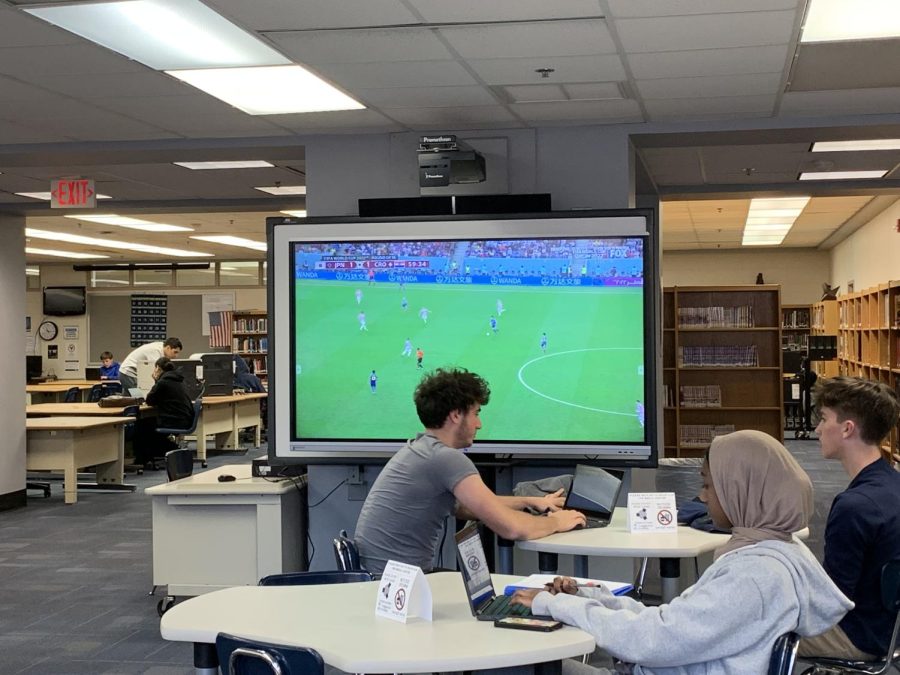 On+December+5th.+2022%2C+several+WCHS+students+are+seen+enjoying+an+intense+World+Cup+knockout+game+between+Japan+vs+Croatia%2C+while+working+in+the+library.