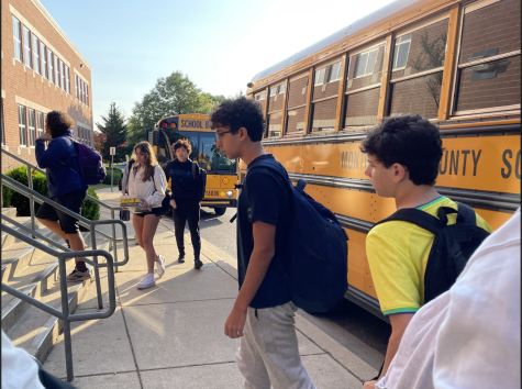 Students arriving at school on May 19. Getting students to and from school safely is a major concern with the new findings of the bus violations. 