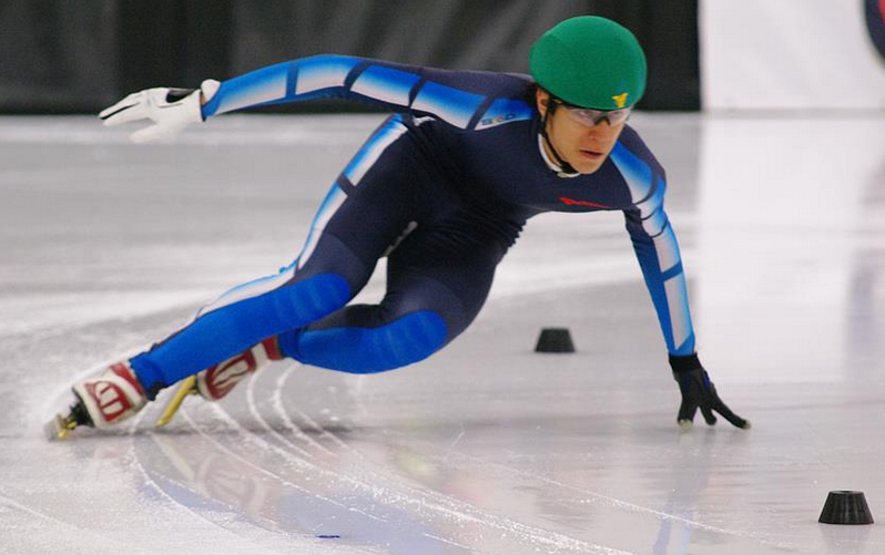 Student speedskater glides past competition