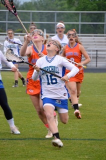 Girls lax pulls out winning season, upset in playoffs