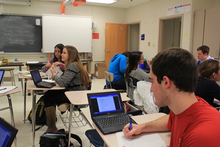 Senior Constantine Kutson works on Google Classroom during a class.