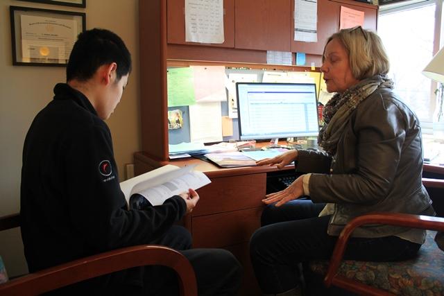 Moore discusses next years course load with sophomore Enoch Li.