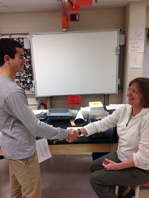 Senior Danny Gordon consults with his teacher for a recommendation.