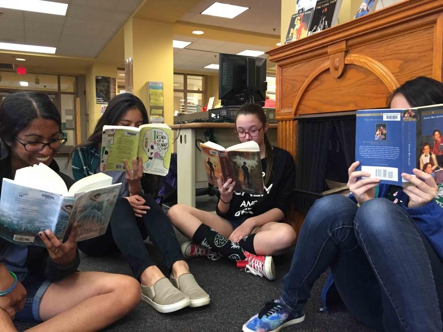 Students+gather+together+to+enjoy+their+favorite+books%2C+new+and+old.