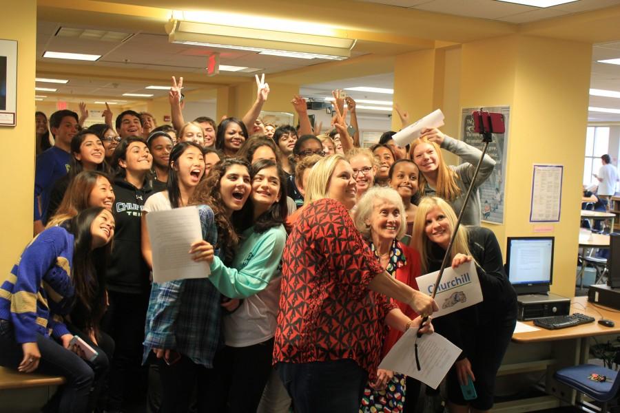 Students gather in the media center to take a selfie that sets a new world record.