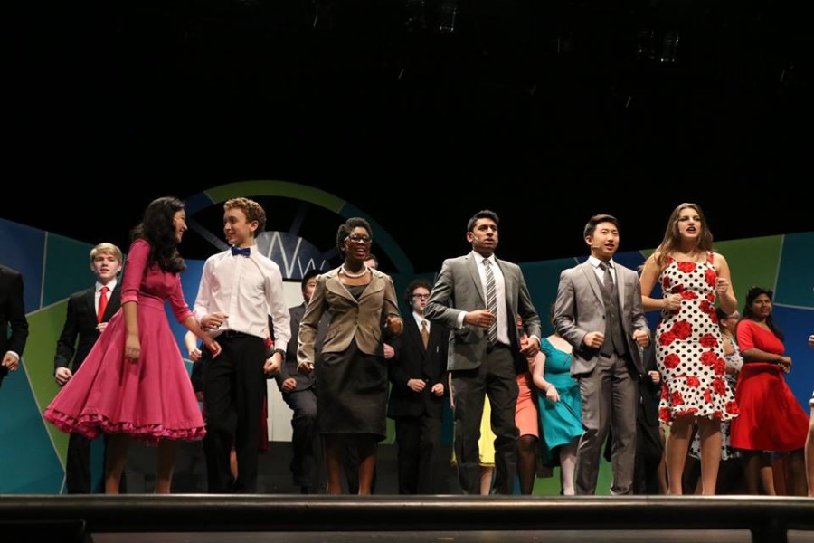 The How to Succeed in Business Without Really Trying cast performs on stage during a dress rehearsal. The show opened Nov. 13. 