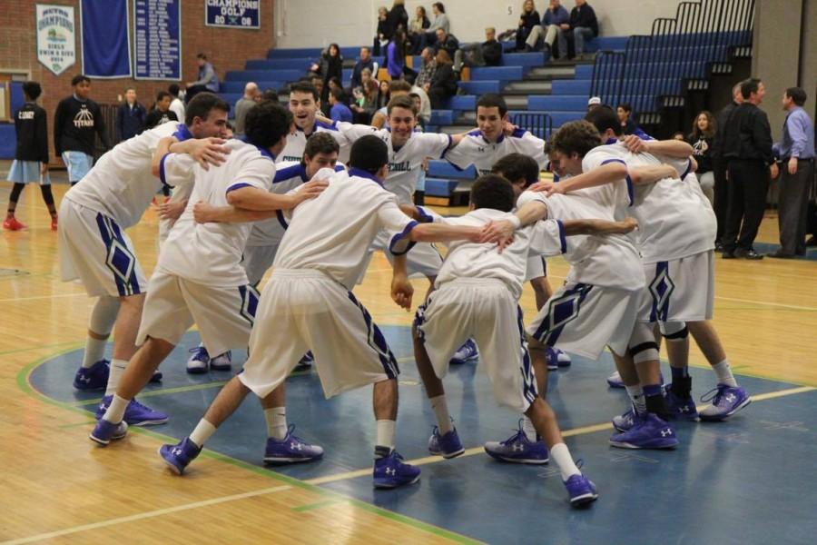 The team gethers in a huddle on the court during a game to get the players pumped up. The team went on a seven-game win streak one point i the season after starting 1-4