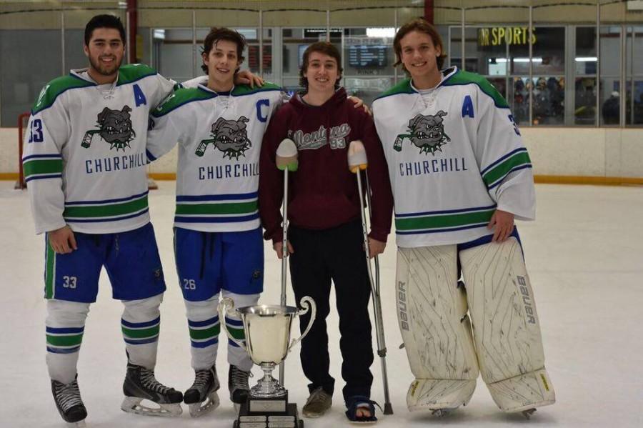 Senior Philip Satin (second from left), joined by seniors Zach Ruvo, Charlie Butler and Markus Hurd.