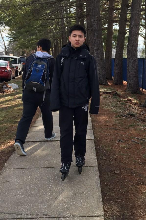 Freshman+Benson+Cheng+rollerblades+during+his+mile+commute+to+and+from+school+each+day.