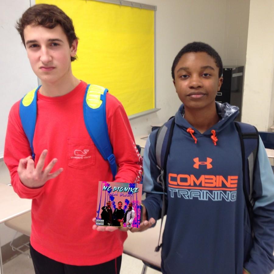 Sophomores Green and Daniels pose with Daniels’ album.