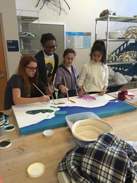 Seniors Josie Scriven, Jessica Dibble, Carly Rosenfeld and Sophia Kim paint sea creatures.