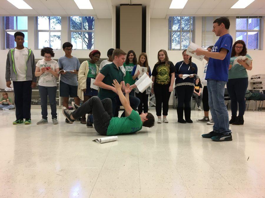 Junior Nick Schaap, Senior Alex Scott and members of the cast of “A Funny Thing Happened on the Way to the Forum” rehearse a scene.