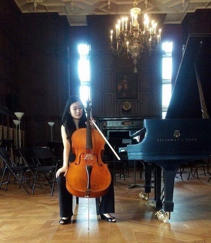 Senior Jenna Wang takes a break from playing the cello. She has been playing for many years and hopes to pursue her music further.